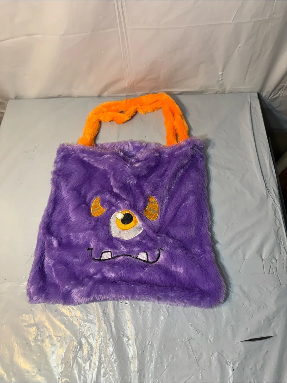 purple furry monster trick or treat bag